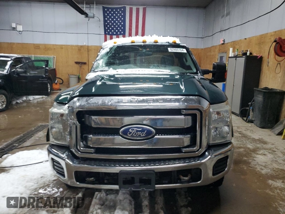 2011 Ford F-250 XL with VIN 1FT7X2BT3BEA11867, listed as a Copart auction lot 82906164 with 206,888 mi miles and Salvage Title. Bid and sale history available at DreamBid. Image 5.