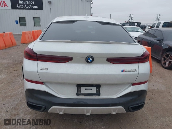 2021 BMW X6 M50i z VIN 5UXCY8C01M9E51506, wystawiony jako IAAI lot #41538726 z przebiegiem Nie podano mil oraz . Historia ofert i sprzedaży dostępna na DreamBid. Obrazek 16.
