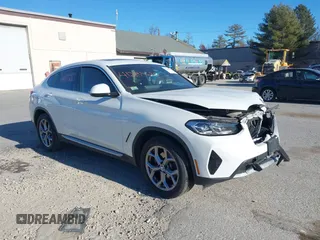 2022 BMW X4 xDrive30i with VIN 5UX33DT06N9M76214, listed as a IAAI auction lot 41285650 with 29,638 mi miles. Bid and sale history available at carsss.com. Image 1.
