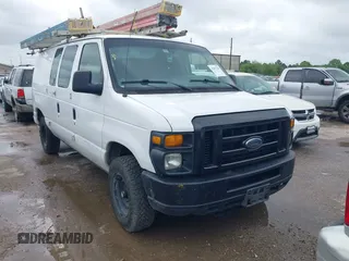 2012 Ford Econoline Cargo Recreational z VIN 1FTNE2EW7CDB21279, wystawiony jako IAAI lot #42197160 z przebiegiem 309 563 mil mil oraz . Historia ofert i sprzedaży dostępna na DreamBid. Obrazek 1.