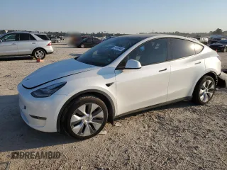 2023 Tesla Model Y Long Range z VIN 7SAYGDEE8PA069248, wystawiony jako Copart lot #74120944 z przebiegiem 17 085 mil mil oraz Szkody całkowita. Historia ofert i sprzedaży dostępna na DreamBid. Obrazek 1.