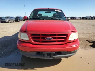 2001 Ford F-150 XL with VIN 1FTZX17211NB16120, listed as a Copart auction lot 54884765 with 124,196 mi miles and Salvage title. Bid and sale history available at DreamBid. Image 5.