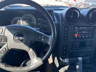 2005 Hummer H2 SUT with VIN 5GRGN22U35H113041, listed as a Copart auction lot 76730334 with 269,232 mi miles and Clean Title. Bid and sale history available at carsss.com. Image 9.