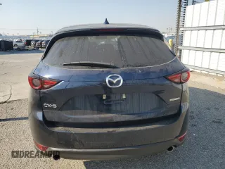 2021 Mazda CX-5 Grand Touring with VIN JM3KFADM7M0385788, listed as a Copart auction lot 88065255 with 27,787 mi miles and Salvage Title. Bid and sale history available at carsss.com. Image 6.