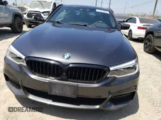2018 BMW 5 Series 530e with VIN WBAJA9C55JG623181, listed as a Copart auction lot 61593983 with 63,577 mi miles and . Bid and sale history available at DreamBid. Image 5.