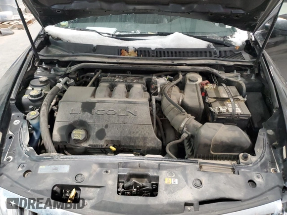 2012 Lincoln MKS z VIN 1LNHL9ER5CG806929, wystawiony jako Copart lot #85328514 z przebiegiem 155 015 mil mil oraz Szkoda całkowita • Salvage title. Historia ofert i sprzedaży dostępna na DreamBid. Obrazek 11.