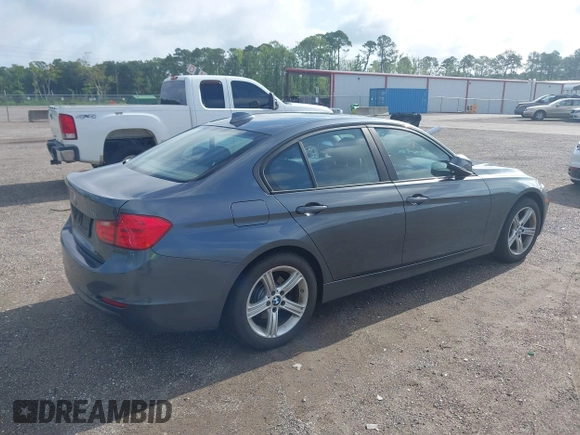 2015 BMW 3 Series 328i with VIN WBA3A5G59FNS85458, listed as a IAAI auction lot 42438242 with 133,483 mi miles and . Bid and sale history available at DreamBid. Image 4.