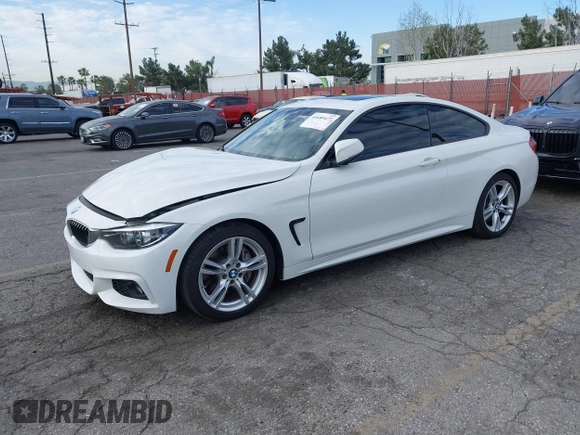 2019 BMW 4 Series 430i with VIN WBA4W3C5XKAF93081, listed as a IAAI auction lot 41689477 with 87,936 mi miles and . Bid and sale history available at DreamBid. Image 21.