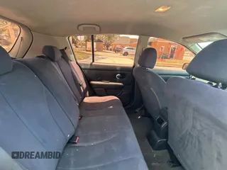 2009 Nissan Versa S with VIN 3N1BC13E19L499018, listed as a Copart auction lot 56711385 with 196,451 mi miles and Clean Title. Bid and sale history available at DreamBid. Image 6.