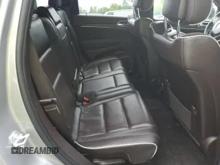 2018 Jeep Grand Cherokee Overland z VIN 1C4RJFCTXJC108624, wystawiony jako Copart lot #53738094 z przebiegiem 83 040 mil mil oraz . Historia ofert i sprzedaży dostępna na DreamBid. Obrazek 11.
