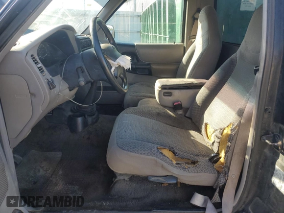 1999 Ford Ranger XL with VIN 1FTYR10V7XPB92187, listed as a Copart auction lot 74777804 with 295,206 mi miles and Salvage Title. Bid and sale history available at carsss.com. Image 7.