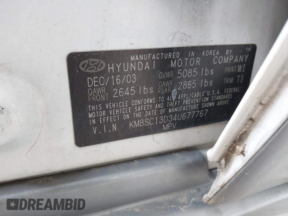 2004 Hyundai Santa Fe GLS with VIN KM8SC13D34U677767, listed as a IAAI auction lot 42054372 with 192,204 mi miles. Bid and sale history available at carsss.com. Image 9.