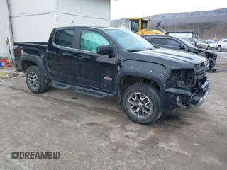 2016 GMC Canyon z VIN 1GTP6CE10G1391204, wystawiony jako IAAI lot #41435355 z przebiegiem 144 918 mil mil oraz . Historia ofert i sprzedaży dostępna na DreamBid. Obrazek 1.