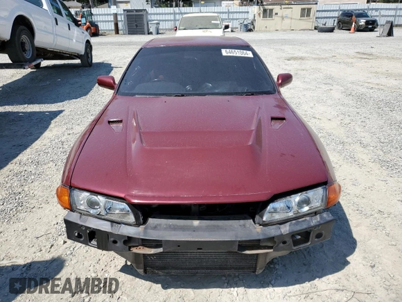 1990 Nissan Skyline z VIN BNR32011442, wystawiony jako Copart lot #64651064 z przebiegiem 118 579 mil mil oraz Czysty tytuł • Clean title. Historia ofert i sprzedaży dostępna na DreamBid. Obrazek 5.