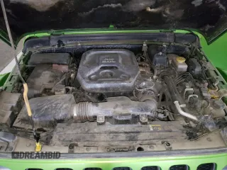 2018 Jeep Wrangler Unlimited Rubicon with VIN 1C4HJXFN3JW245997, listed as a Copart auction lot 52200725 with 101,739 mi miles and Clean title. Bid and sale history available at DreamBid. Image 12.