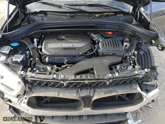 2021 BMW X2 xDrive28i with VIN WBXYJ1C07M5S21169, listed as a Copart auction lot 77829574 with 24,173 mi miles and Salvage Title. Bid and sale history available at carsss.com. Image 12.