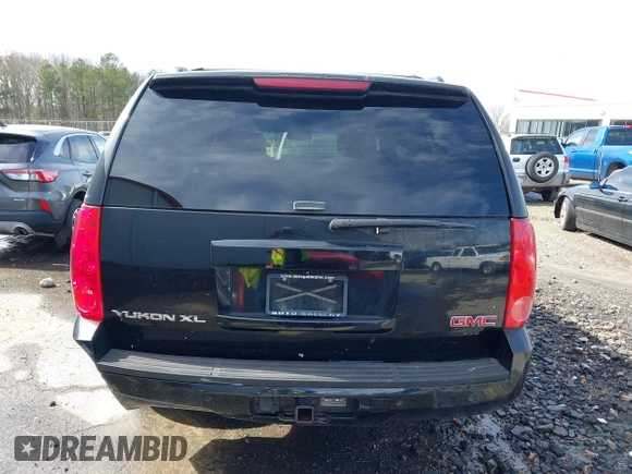 2014 GMC Yukon XL SLT with VIN 1GKS2KE77ER199723, listed as a IAAI auction lot 41555112 with 215,436 mi miles. Bid and sale history available at carsss.com. Image 16.
