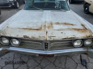 1967 Chrysler New Yorker z VIN CH43K73231908, wystawiony jako Copart lot #76277454 z przebiegiem Nie podano mil oraz Nie do naprawy. Historia ofert i sprzedaży dostępna na DreamBid. Obrazek 11.