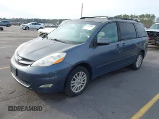 2009 Toyota Sienna XLE with VIN 5TDBK22C79S026370, listed as a IAAI auction lot 41471005 with 200,720 mi miles and . Bid and sale history available at DreamBid. Image 2.