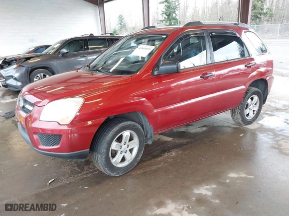 2009 Kia Sportage LX with VIN KNDJE723597600071, listed as a IAAI auction lot 41859059 with 135,760 mi miles. Bid and sale history available at carsss.com. Image 2.