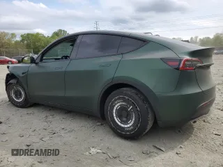 2024 Tesla Model Y Long Range z VIN 7SAYGAEEXRF987104, wystawiony jako Copart lot #54056015 z przebiegiem 24 027 mil mil oraz Szkoda całkowita • Salvage title. Historia ofert i sprzedaży dostępna na DreamBid. Obrazek 2.