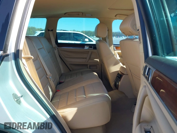 2008 Volkswagen Touareg V6 with VIN WVGBE77L88D003117, listed as a IAAI auction lot 42049007 with 156,940 mi miles and . Bid and sale history available at DreamBid. Image 8.