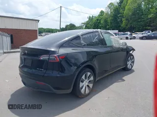 2023 Tesla Model Y Long Range with VIN 7SAYGDEE6PA166514, listed as a IAAI auction lot 41359540 with 16,271 mi miles. Bid and sale history available at carsss.com. Image 4.