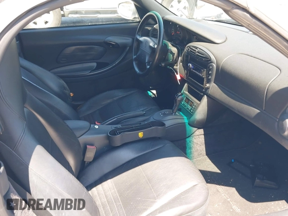 1999 Porsche Boxster with VIN WP0CA2984XU624983, listed as a IAAI auction lot 42722102 with 100,889 mi miles and . Bid and sale history available at DreamBid. Image 5.