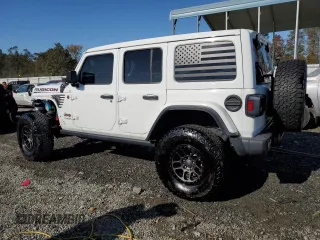 2022 Jeep Wrangler Unlimited Rubicon with VIN 1C4JJXFG2NW125360, listed as a Copart auction lot 76773624 with 22,978 mi miles and Salvage title. Bid and sale history available at DreamBid. Image 2.