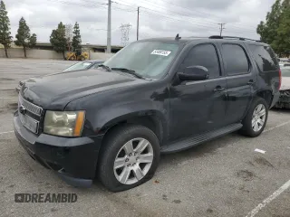 2007 Chevrolet Tahoe LT z VIN 1GNFC13047R276388, wystawiony jako Copart lot #53469155 z przebiegiem Nie podano mil oraz Szkoda całkowita • Salvage title. Historia ofert i sprzedaży dostępna na DreamBid. Obrazek 1.