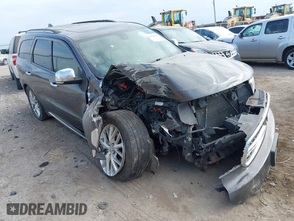 2014 Dodge Durango Citadel with VIN 1C4RDHEG2EC381324, listed as a IAAI auction lot 42021611 with 104,178 mi miles and . Bid and sale history available at DreamBid. Image 1.