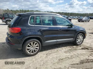 2012 Volkswagen Tiguan SE with VIN WVGAV7AX1CW610349, listed as a Copart auction lot 49250985 with 139,718 mi miles and Salvage Title. Bid and sale history available at DreamBid. Image 3.