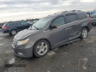 2012 Honda Odyssey Touring with VIN 5FNRL5H96CB088461, listed as a Copart auction lot 53262655 with 220,846 mi miles and Clean Title. Bid and sale history available at carsss.com. Image 1.