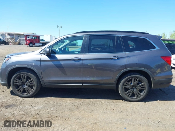 2021 Honda Pilot Special Edition z VIN 5FNYF6H27MB043638, wystawiony jako IAAI lot #42127878 z przebiegiem 50 401 mil mil oraz . Historia ofert i sprzedaży dostępna na DreamBid. Obrazek 14.