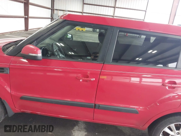2012 Kia Soul + with VIN KNDJT2A69C7432852, listed as a IAAI auction lot 41960420 with 298,565 mi miles. Bid and sale history available at carsss.com. Image 12.