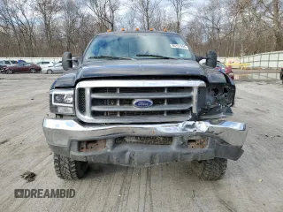 2000 Ford F-250 with VIN 1FTNF21S9YEA14056, listed as a Copart auction lot 80151994 with 165,477 mi miles and Salvage title. Bid and sale history available at DreamBid. Image 5.