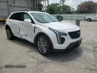 2020 Cadillac XT4 FWD Sport with VIN 1GYFZER49LF123830, listed as a Copart auction lot 55737985 with 98,871 mi miles and Salvage title. Bid and sale history available at DreamBid. Image 14.