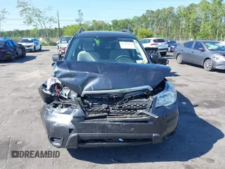 2015 Subaru Forester 2.5i with VIN JF2SJABC6FH823742, listed as a IAAI auction lot 42069857 with 74,966 mi miles. Bid and sale history available at carsss.com. Image 12.