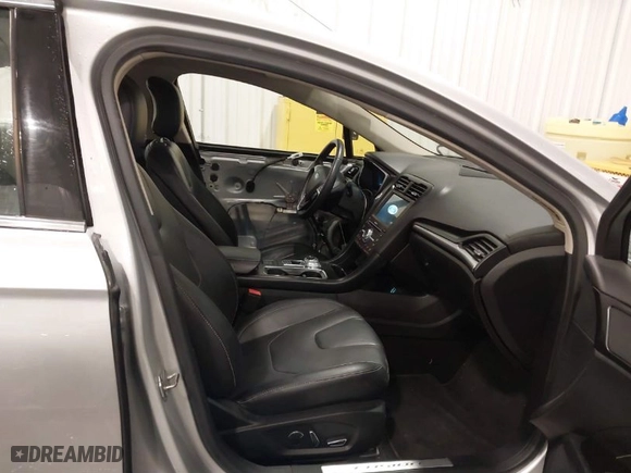 2019 Ford Fusion Hybrid Titanium with VIN 3FA6P0RU9KR105317, listed as a IAAI auction lot 41676108 with 102,265 mi miles. Bid and sale history available at carsss.com. Image 5.