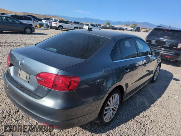2013 Volkswagen Jetta TDI w/Premium с VIN 3VWLL7AJ5DM256459, выставлен на аукционе Copart как лот 59716405 с пробегом 162 464 миль миль и Списание • Salvage title. История ставок и продаж доступна на DreamBid. Изображение 3.