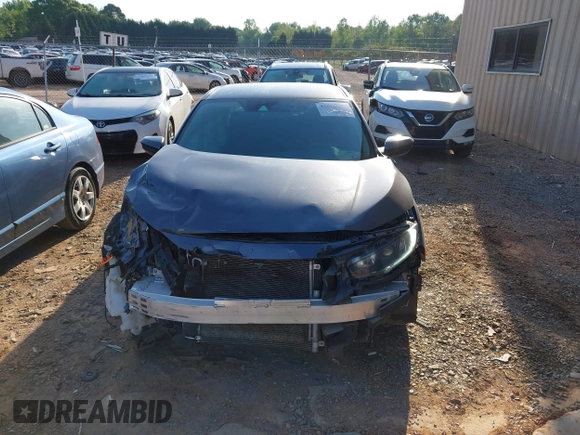 2020 Honda Civic LX with VIN 2HGFC2F67LH534381, listed as a IAAI auction lot 42056676 with 124,344 mi miles and . Bid and sale history available at DreamBid. Image 13.