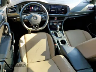 2019 Volkswagen Jetta SEL with VIN 3VWEB7BU0KM259867, listed as a Copart auction lot 56995055 with 64,526 mi miles and Salvage title. Bid and sale history available at DreamBid. Image 8.