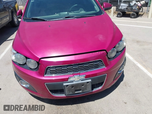 2014 Chevrolet Sonic LT with VIN 1G1JC5SH7E4121869, listed as a IAAI auction lot 42204925 with 122,394 mi miles and . Bid and sale history available at DreamBid. Image 13.