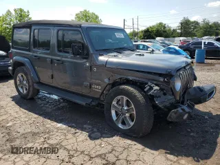 2022 Jeep Wrangler Unlimited Sahara with VIN 1C4HJXENXNW244773, listed as a Copart auction lot 59694095 with 21,871 mi miles and Salvage title. Bid and sale history available at DreamBid. Image 4.
