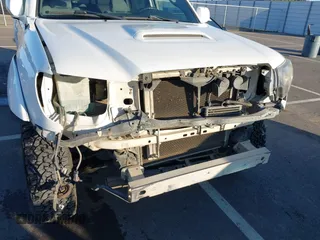 2006 Toyota Tacoma z VIN 5TELU42N66Z176139, wystawiony jako IAAI lot #41343253 z przebiegiem 145 719 mil mil oraz . Historia ofert i sprzedaży dostępna na DreamBid. Obrazek 6.