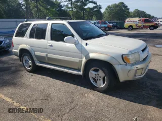 2003 Infiniti QX4 with VIN JNRDR09X33W250292, listed as a Copart auction lot 56020474 with 260,391 mi miles and Clean Title. Bid and sale history available at DreamBid. Image 4.
