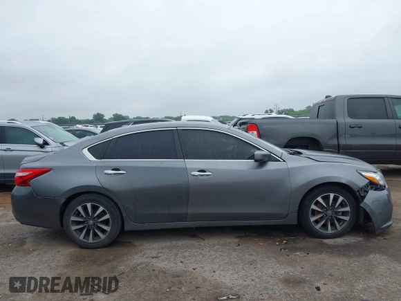 2017 Nissan Altima SV with VIN 1N4AL3AP8HC188002, listed as a IAAI auction lot 42423163 with 106,617 mi miles and . Bid and sale history available at DreamBid. Image 14.