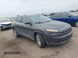 2014 Jeep Cherokee Limited with VIN 1C4PJLDS9EW301718, listed as a IAAI auction lot 41615778 with 114,022 mi miles and . Bid and sale history available at DreamBid. Image 13.