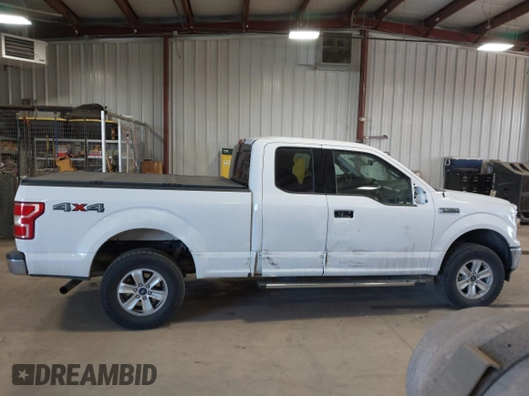 2020 Ford F-150 XL with VIN 1FTFX1E42LKD79888, listed as a IAAI auction lot 41511954 with 163,904 mi miles. Bid and sale history available at carsss.com. Image 13.
