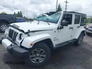 2016 Jeep Wrangler Unlimited Sahara with VIN 1C4BJWEG8GL129577, listed as a IAAI auction lot 42184373 with 185,761 mi miles and . Bid and sale history available at DreamBid. Image 16.